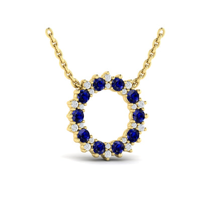 Diamond and Blue Sapphire Open Starburst Circle Pendant Necklace