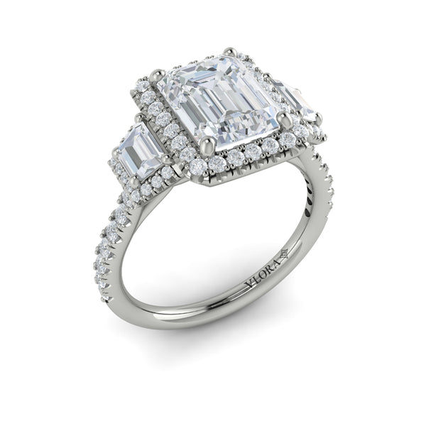 Emerald Cut Three Stone, Halo Engagement Ring in Platinum by Vlora Bridal
