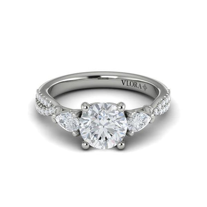 Round Three Stone Engagement Ring in Platinum by Vlora Bridal