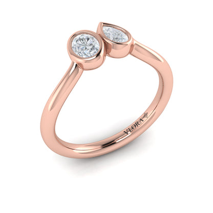 Bezel‑Set Pear and Oval Diamond  Bypass Ring