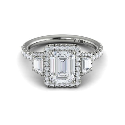 Emerald Cut Three Stone, Halo Engagement Ring in Platinum by Vlora Bridal