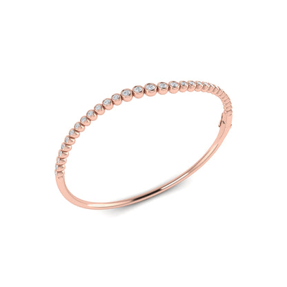 Graduated Bezel Set Diamond Bangle