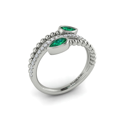 Bezel Set Pear shaped Emerald and Diamond Wrap Ring