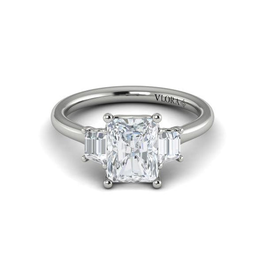 Emerald Cut Three Stone Engagement Ring in Platinum by Vlora Bridal