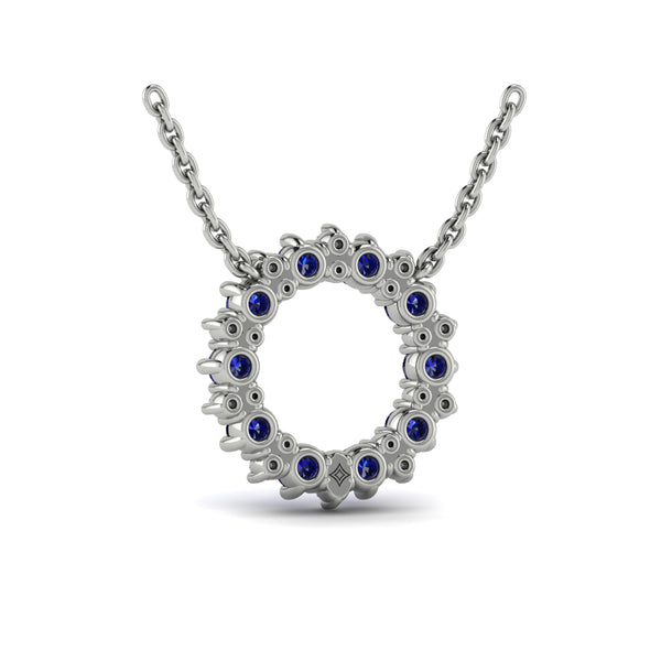 Diamond and Blue Sapphire Open Starburst Circle Pendant Necklace
