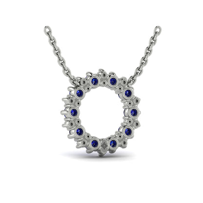Diamond and Blue Sapphire Open Starburst Circle Pendant Necklace