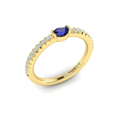Diamond and Oval Sapphire Centerstone Ring