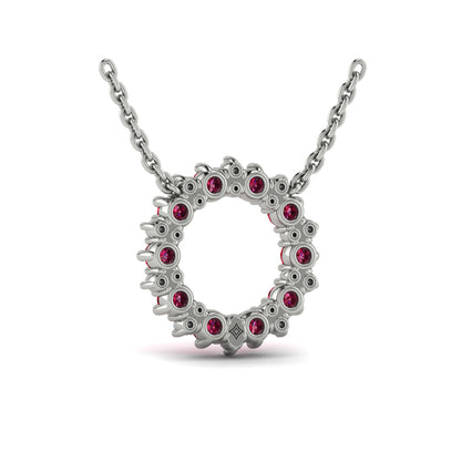 Diamond and Ruby Open Starburst Circle Pendant Necklace