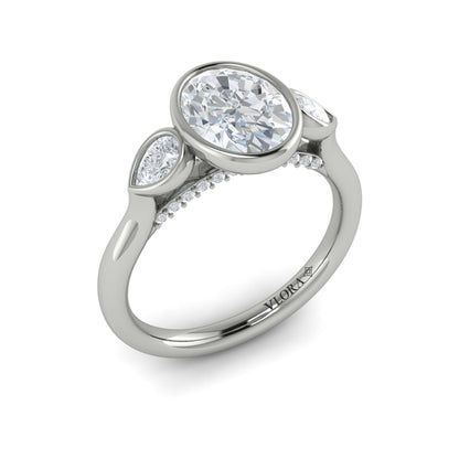 Oval Three Stone, Bezel Engagement Ring in Platinum by Vlora Bridal