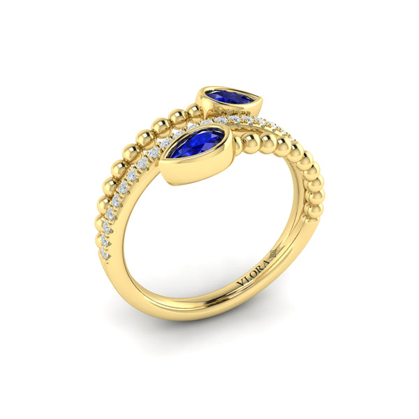 Bezel Set Pear shaped Sapphire and Diamond Wrap Ring