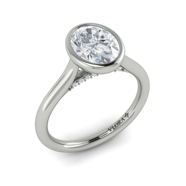 Oval Solitaire, Bezel Engagement Ring in Platinum by Vlora Bridal