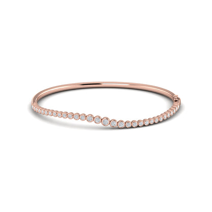 Graduated Bezel Set Diamond Bangle