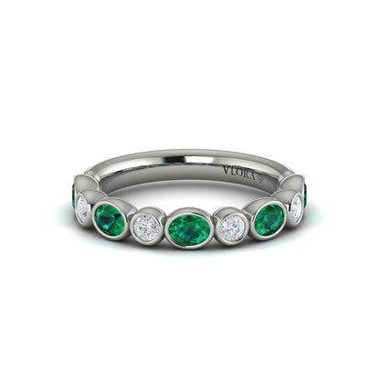 Oval and Round Bezel Set Diamond and Emerald Ring