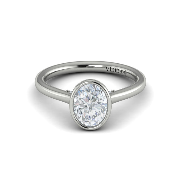 Oval Solitaire, Bezel Engagement Ring in Platinum by Vlora Bridal
