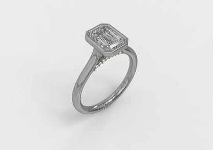 Singular Emerald Cut Bezel Engagement Ring