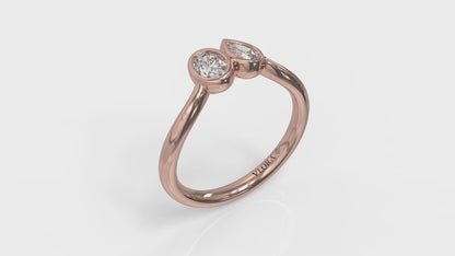 Bezel‑Set Pear and Oval Diamond  Bypass Ring