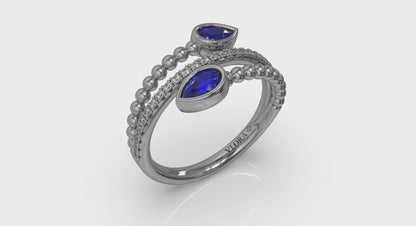 Bezel Set Pear shaped Sapphire and Diamond Wrap Ring