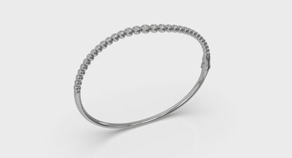 Graduated Bezel Set Diamond Bangle
