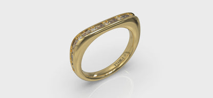 Single Diamond Baguette and Round Channel Set Ring