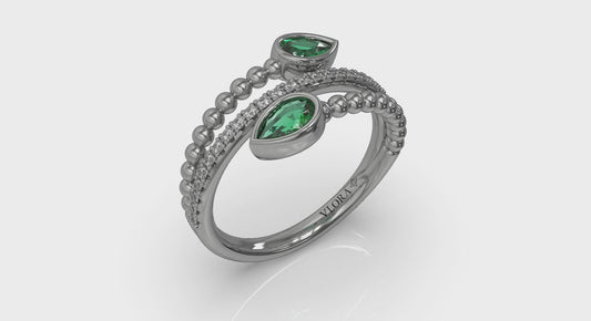 Bezel Set Pear shaped Emerald and Diamond Wrap Ring