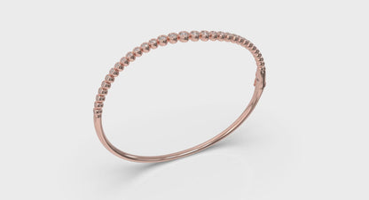 Graduated Bezel Set Diamond Bangle