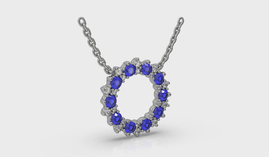 Diamond and Blue Sapphire Open Starburst Circle Pendant Necklace